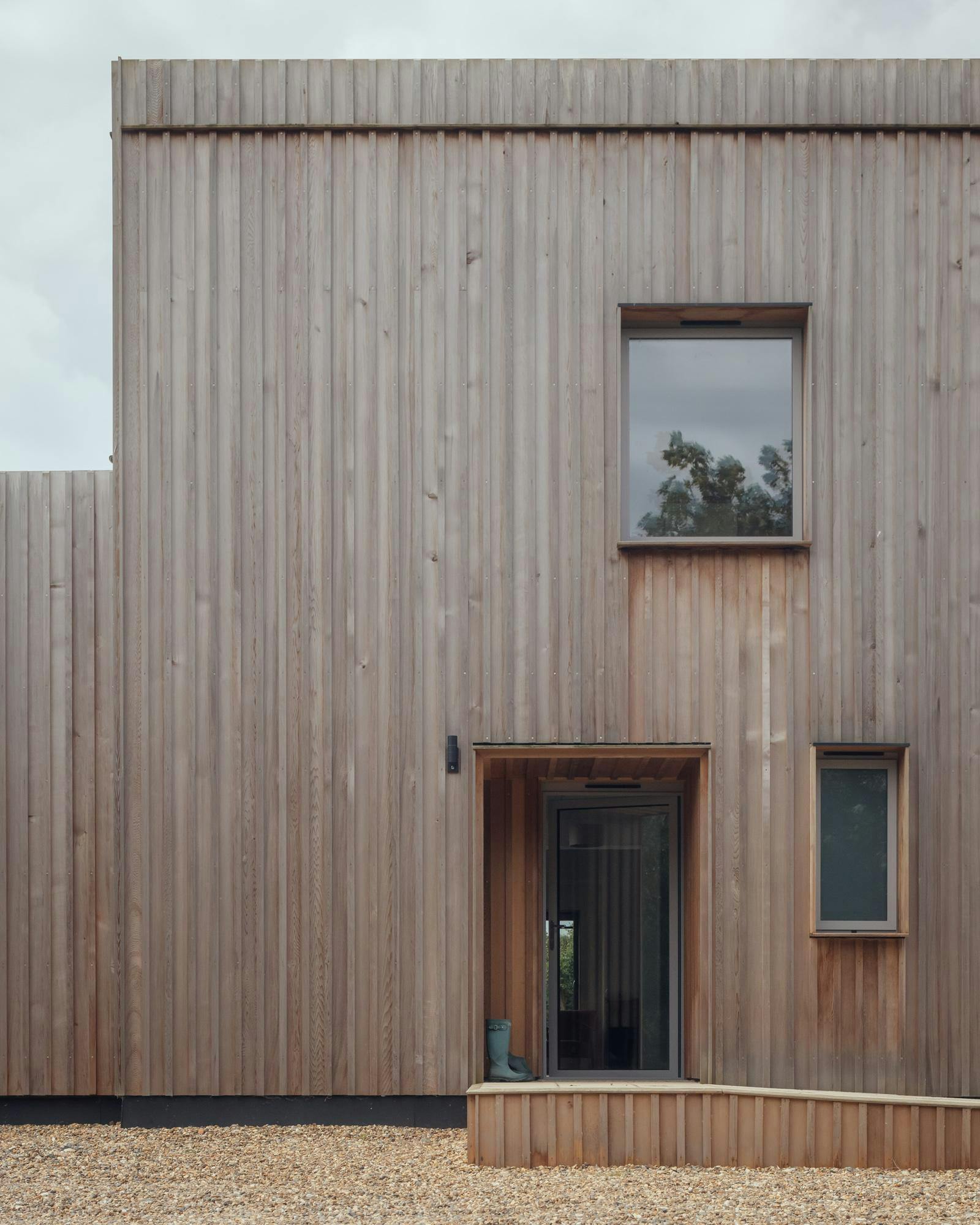 Entrance to contemporary timber clad home by Studio Bark