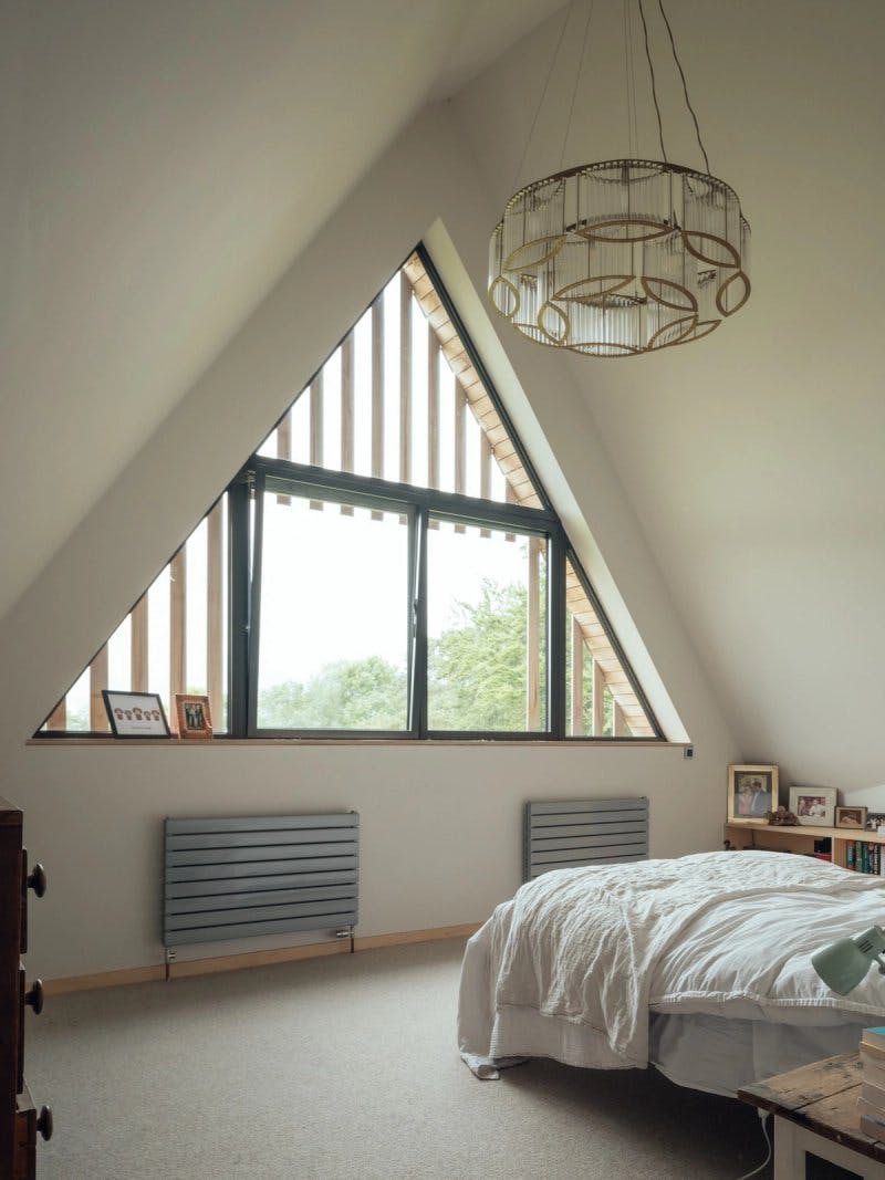 Bedroom with pitched window by Studio Bark