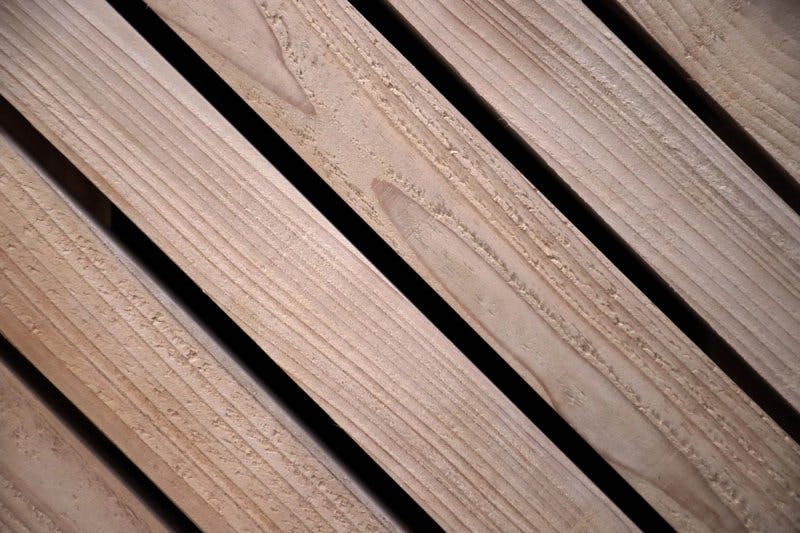 Close up view of timber battens used for cladding of garden shed